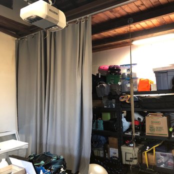 Daniel Lugo Construction - Hung garage curtain and TRX for home gym. - General Contractors Near Me Daniel Lugo Construction - Hung garage curtain and TRX for home gym. - General Contractors Near Me