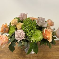 Basic Bitch Blooms - Peachy Compote - featuring peach & lilac roses, green hydrangeas & chrysanthemums in a grey compote.