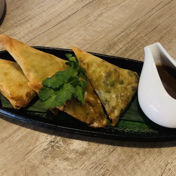 PŌPA - Rangoon Samuza-Home made pastry filled with potatoe, tumeric, shallots, and ground pepper served with tamarind chutney $7.50 - Burmese Near Me - Toronto, Ontario PŌPA - Rangoon Samuza-Home made pastry filled with potatoe, tumeric, shallots, and ground pepper served with tamarind chutney $7.50 - Burmese Near Me - Toronto, Ontario