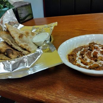 Bamiyan kabobs - Simmered eggplant drizzled with homemade yogurt, and toasted pita @ Bamiyan Kebabs. - Afghan Near Me - Rochester, New York Bamiyan kabobs - Simmered eggplant drizzled with homemade yogurt, and toasted pita @ Bamiyan Kebabs. - Afghan Near Me - Rochester, New York