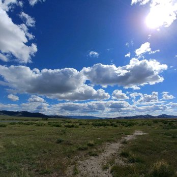 Independence Rock Rest Stop & Historic Site - Wyoming sky from independence rock walking path - Rest Stops Near Me - Casper, Wyoming Independence Rock Rest Stop & Historic Site - Wyoming sky from independence rock walking path - Rest Stops Near Me - Casper, Wyoming