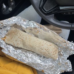 Burrito with chorizo, beans, eggs, & papas