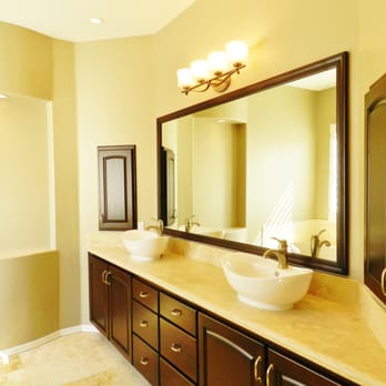 Trade Winds Construction - a bathroom with two sinks and a large mirror - General Contractors Near Me - Scottsdale, Arizona Trade Winds Construction - a bathroom with two sinks and a large mirror - General Contractors Near Me - Scottsdale, Arizona