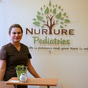 Nurture Pediatrics - Nurse Eny at our welcome desk - Pediatricians Near Me - Belliare, Texas