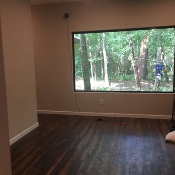 New Slate Properties - living area complete with giant window! - General Contractors Near Me - Pearland, Texas