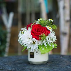 gia bella flowers and gifts - Great Mother's day gift. Our Root candle with fresh flowers top. $39.95