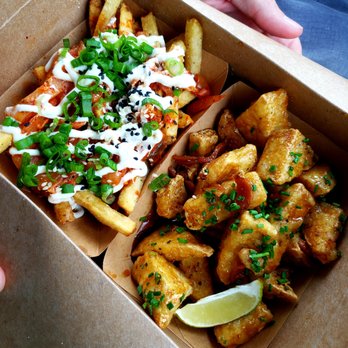 The Vanguard - Kimchi Fries and Burnt Ginger Tofu. - Bars Near Me - Milwaukee, Wisconsin The Vanguard - Kimchi Fries and Burnt Ginger Tofu. - Bars Near Me - Milwaukee, Wisconsin