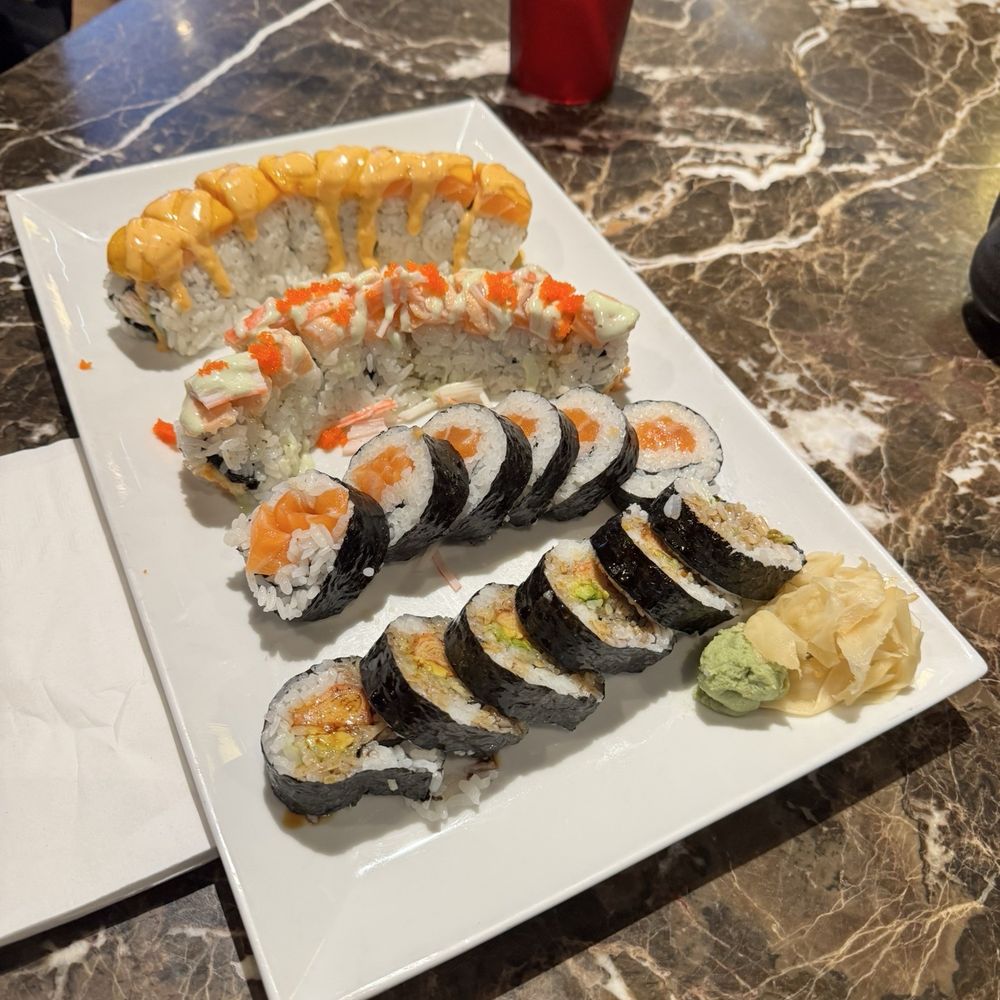 Salmon roll, Salmon and Mango Roll, Shrimp Tempura, and I can't remember the other one