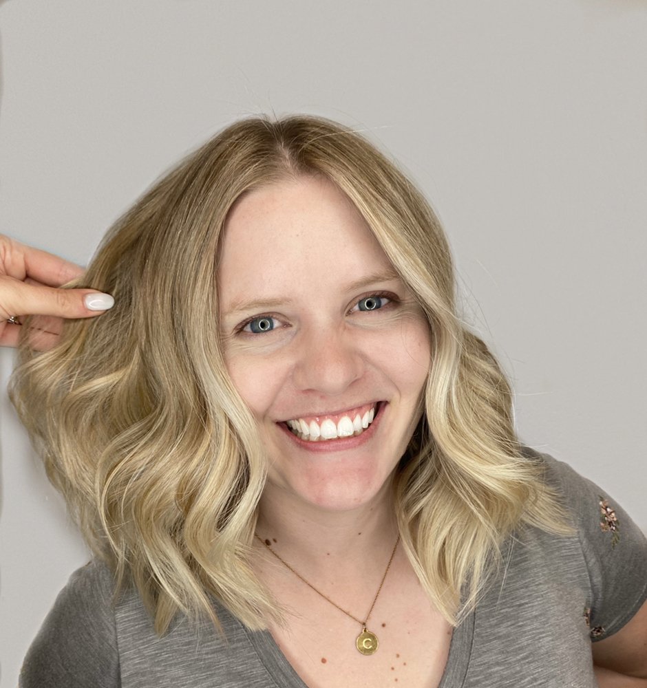 Kelly Almutawa - Leidan Mitchell Salon & Spa Logo