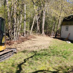 V & S Landscaping LLC - Grading of watershed away from this shed.