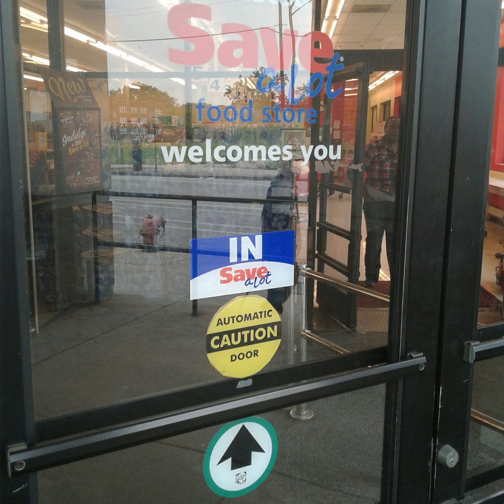 Save A Lot - a sign in the window of a store - Grocery Near Me - Chicago, Illinois Save A Lot - a sign in the window of a store - Grocery Near Me - Chicago, Illinois