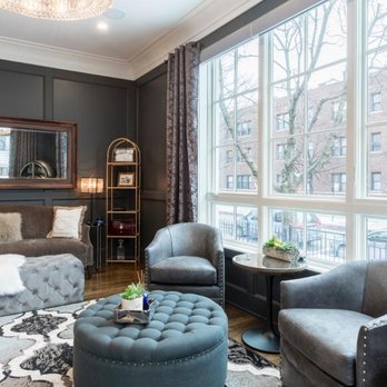 A Better Finish - a living room with a large window - Masonry/Concrete Near Me A Better Finish - a living room with a large window - Masonry/Concrete Near Me