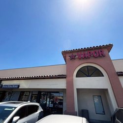 Red Star Vapor & Smoke - Exterior- Storefront and signage