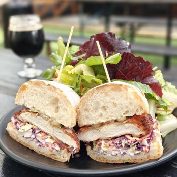Ghost Town Brewing - Laurel - Yummy fried chicken sando with cole slaw, choice of salad or fries, $13 on 3/6/24, with three types of hot sauce à volonté. - Breweries Near Me - Oakland, California Ghost Town Brewing - Laurel - Yummy fried chicken sando with cole slaw, choice of salad or fries, $13 on 3/6/24, with three types of hot sauce à volonté. - Breweries Near Me - Oakland, California