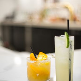 The Front Room Lounge - two cocktails on the bar - Cocktail Bars Near Me - Anaheim, California The Front Room Lounge - two cocktails on the bar - Cocktail Bars Near Me - Anaheim, California