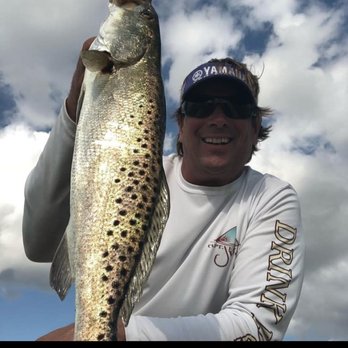 Captain Jeff Vickers - Captain Jeff with a spotted trout - Fishing Near Me