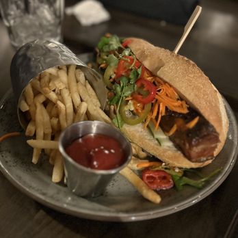 The 1894 Lodge - Special: Pork belly bahn mi Crispy pork belly, general tso sauce, cucumber, pickled carrot, jalapeño, cilantro, and lime - Bars Near Me - New Washington, Indiana The 1894 Lodge - Special: Pork belly bahn mi Crispy pork belly, general tso sauce, cucumber, pickled carrot, jalapeño, cilantro, and lime - Bars Near Me - New Washington, Indiana