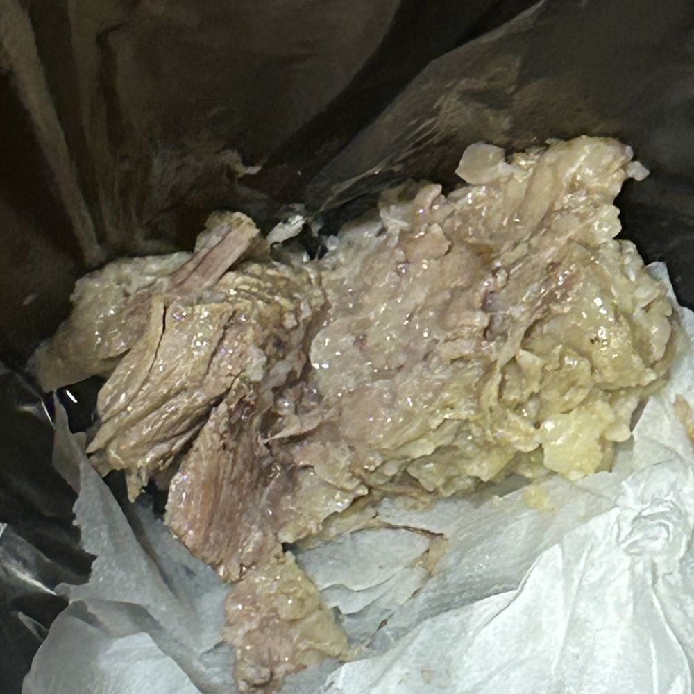 a piece of meat in a plastic bag a piece of meat in a plastic bag