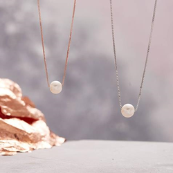 Artisan Jewelers - Floating Pearl necklace..... Classic with simple elegance.  Call and order of come on by.
