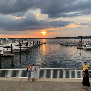 Marina Grille - View from the back deck, looking out on the marina at sunset time - Seafood Near Me - Belmar, New Jersey Marina Grille - View from the back deck, looking out on the marina at sunset time - Seafood Near Me - Belmar, New Jersey
