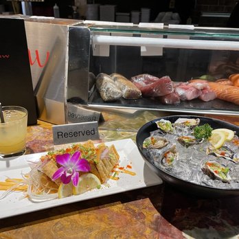 Raw Sushi Bistro - Here I am showing the Ahi Tuna Taco, Kumamoto Oysters in a Half Shell, and Green Tea Drink ! - Sushi Bars Near Me - Modesto, California