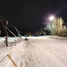 Riding in the pulley system to the top of the hill Riding in the pulley system to the top of the hill