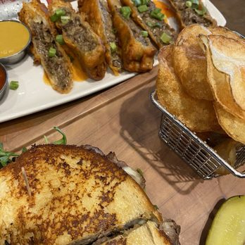 Finney's Crafthouse - Oceanside - Bar seating with Philly egg rolls and smoked tri tip sandwich; everything is big enough to share - New American Near Me - Oceanside, California Finney's Crafthouse - Oceanside - Bar seating with Philly egg rolls and smoked tri tip sandwich; everything is big enough to share - New American Near Me - Oceanside, California