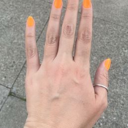 Gel manicure with builder in neon orange