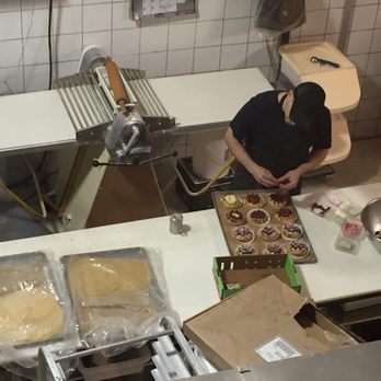 Mamie Clafoutis - Looking down into spotless kitchen from upstairs - Coffee & Tea Near Me - Montreal, Quebec