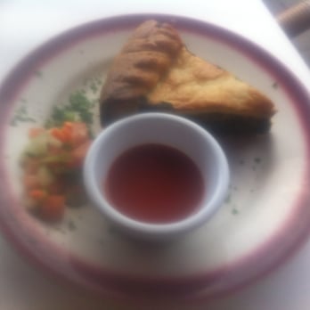 Chez Lulu - Greens pie with hot sauce - French Near Me - Birmingham, Alabama Chez Lulu - Greens pie with hot sauce - French Near Me - Birmingham, Alabama