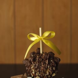 Zapplz Caramel Apples & Treats - Rocky Road caramel apple. Our had dipped caramel apple rolled in pecans, marshmallow, and covered in milk chocolate.