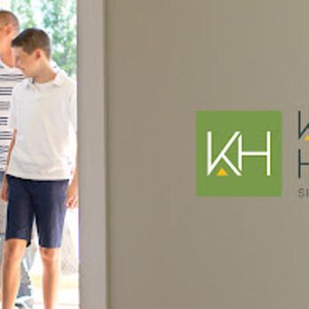 Kaizen Homes - family standing in doorway - General Contractors Near Me Kaizen Homes - family standing in doorway - General Contractors Near Me