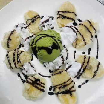 Asian Fusion - a green ice cream sundae with bananas and chocolate sauce - Asian Fusion Near Me - Glen Cove, New York
