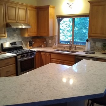 Cutting Edge Renovation - a kitchen with granite counter tops - Flooring Near Me - Blue Jay, California