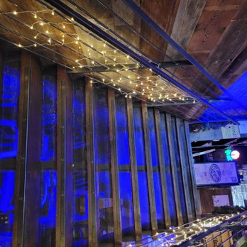 Sweet Spot - a long bar with blue lights - Sports Bars Near Me - Astoria, New York Sweet Spot - a long bar with blue lights - Sports Bars Near Me - Astoria, New York