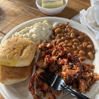 Paula Deen's Lumberjack Feud - The pork, baked beans, rolls and mac-n-cheese. The strawberry shortcake is in the back. - Amusement Parks Near Me - Pigeon Forge, Tennessee Paula Deen's Lumberjack Feud - The pork, baked beans, rolls and mac-n-cheese. The strawberry shortcake is in the back. - Amusement Parks Near Me - Pigeon Forge, Tennessee