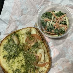 Pesto wrap inside with kale salad