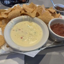Chips and queso and the best salsa ever! Don't know what you changed in the salsa but keep it! Delicious! Chips and queso and the best salsa ever! Don't know what you changed in the salsa but keep it! Delicious!
