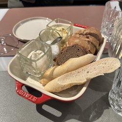 Délice La Brasserie - Bread with truffle butter, sea salt, and garlic salt (top to bottom)