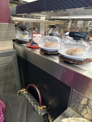 Kura Revolving Sushi Bar by null