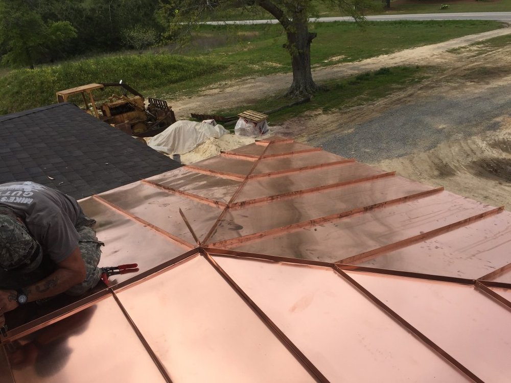 Slide of Mike's Custom Gutters