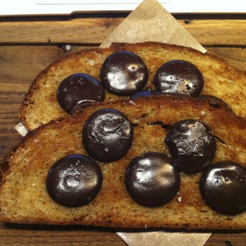 Artifact Coffee - dark chocolate buttons on grilled sourdough - Cafes Near Me - Baltimore, Maryland Artifact Coffee - dark chocolate buttons on grilled sourdough - Cafes Near Me - Baltimore, Maryland