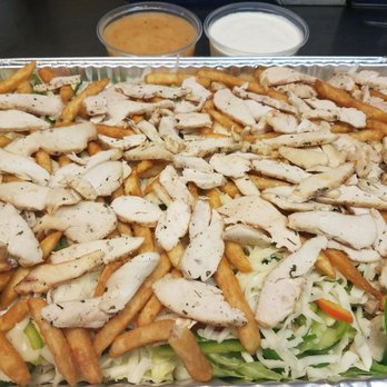 Warrior Pizza - a tray of chicken, lettuce, and french fries - Pizza Near Me - Jeannette, Pennsylvania Warrior Pizza - a tray of chicken, lettuce, and french fries - Pizza Near Me - Jeannette, Pennsylvania