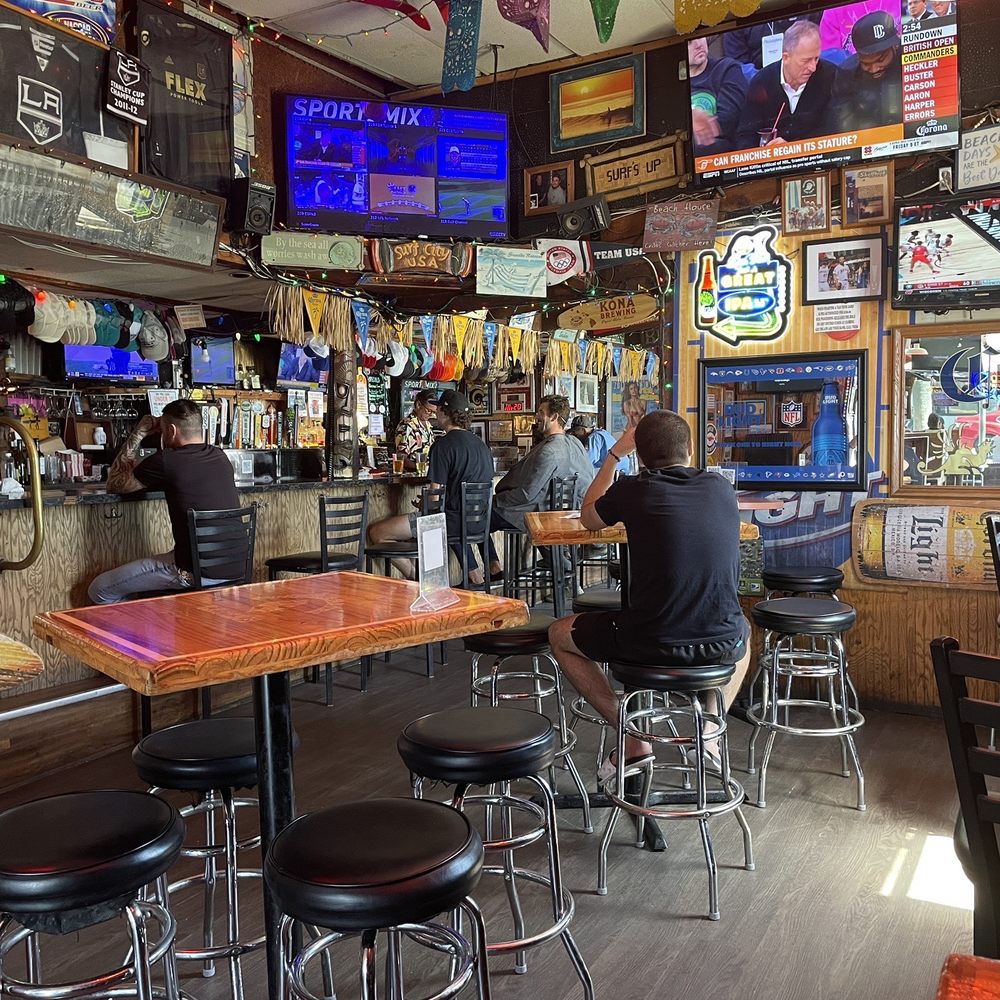 a man sitting at a bar a man sitting at a bar