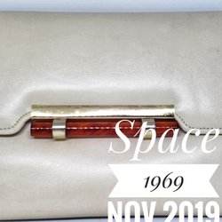 Downtown Relics - Great envelope handbags. Great selection.
