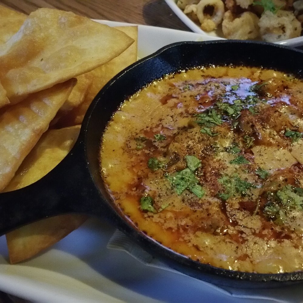 Original Joe's Restaurant & Bar - Queso fundido ($12.50): cheese dip w/chorizo sausage, caramelized onions, peppers, cilantro, crispy flour tortillas - Bars Near Me - Vancouver, British Columbia Original Joe's Restaurant & Bar - Queso fundido ($12.50): cheese dip w/chorizo sausage, caramelized onions, peppers, cilantro, crispy flour tortillas - Bars Near Me - Vancouver, British Columbia