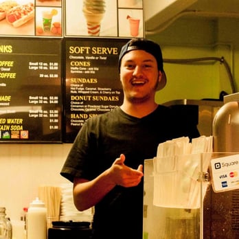 Meaney's Mini Donuts - Friendly doughnut maker, this photo does not show it but he was really cute. - Donuts Near Me - Sarasota, Florida