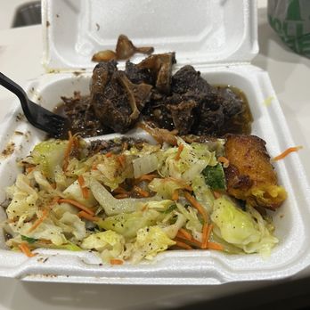 Reggae Caribbean Grille - Oxtail and steamed cabbage didn't - Caribbean Near Me - Destin, Florida Reggae Caribbean Grille - Oxtail and steamed cabbage didn't - Caribbean Near Me - Destin, Florida