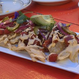 Poke Nachos were delicious - great wanton cihps and good amount of toasted sesame oil. Poke Nachos were delicious - great wanton cihps and good amount of toasted sesame oil.