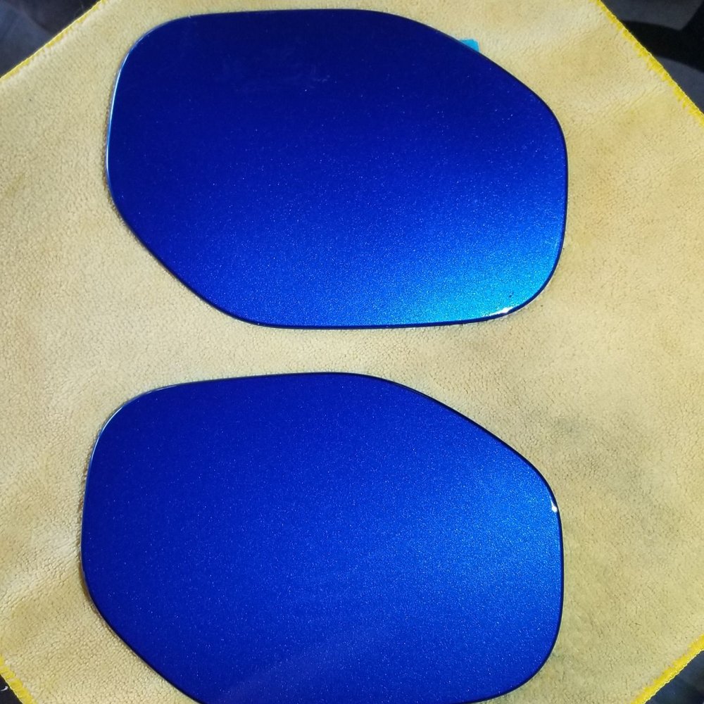 Top is the old part with a broken mount on the back side. Bottom is the replacement part that was painted to match.